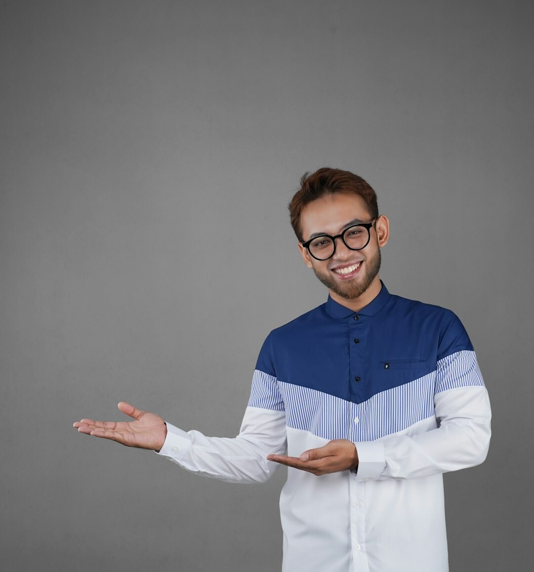 Studio portrait of a smiling man software engineer