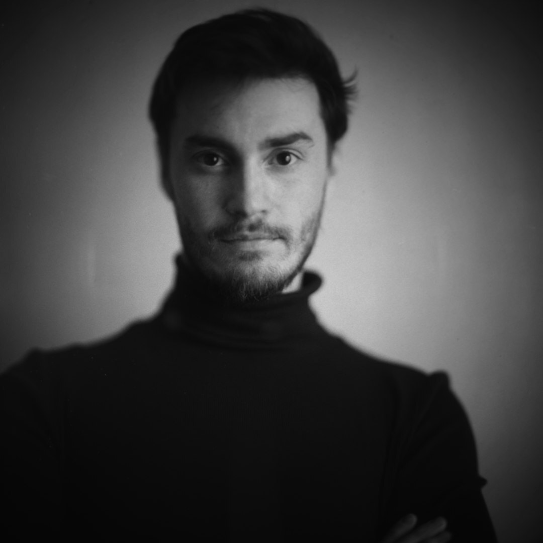 Studio portrait of a smiling man technical editor