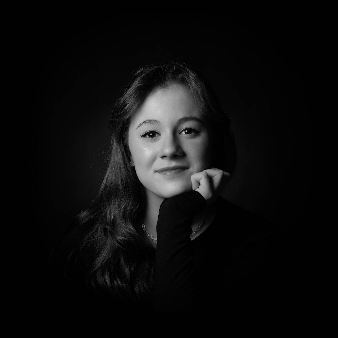 Studio portrait of a smiling woman software developer