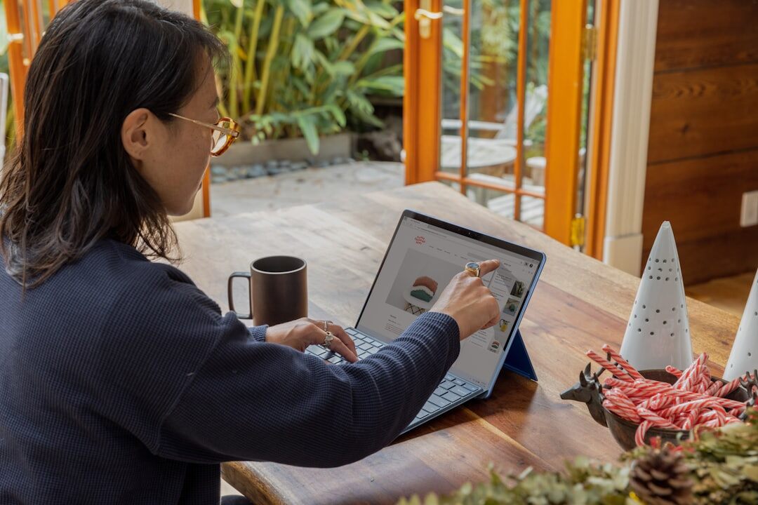 woman working on laptop at home