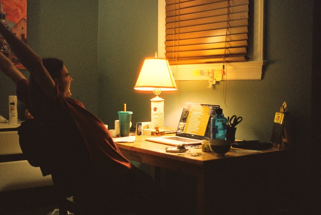person celebrating success at desk